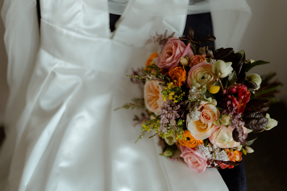 BRIDAL-DRESS-AND-BOUQUET-LAID-OUT