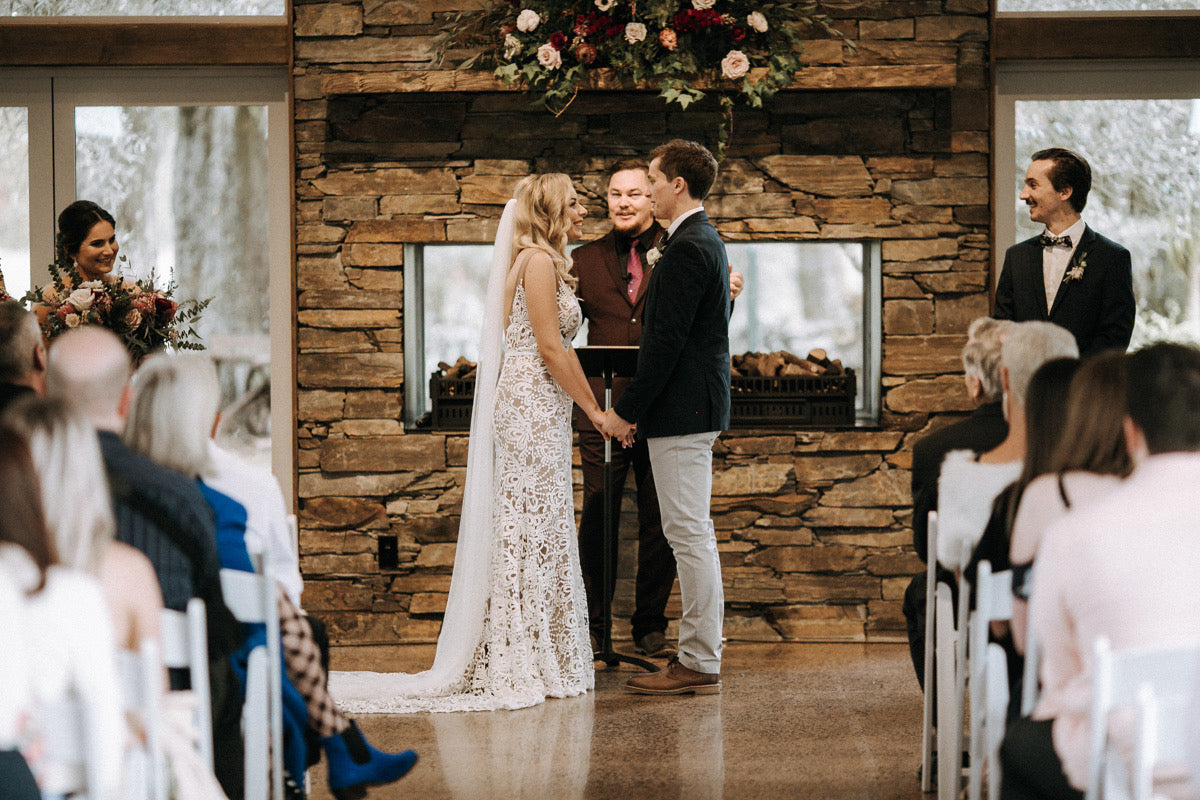 BRIDE-GROOM-DOWN-END-OF-AISLE