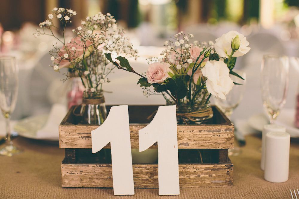 ELEVEN-TABLE-SETTING-WITH-SOFT-TONES-MINI-VASE-ARRANGEMENTS