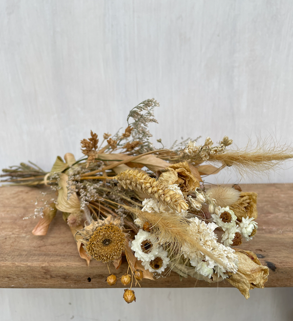 Botanics-small-dried-flower-brown-bouquet-on-wooden-stool