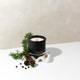 Black Neve candle with wild pines and juniper berry on display